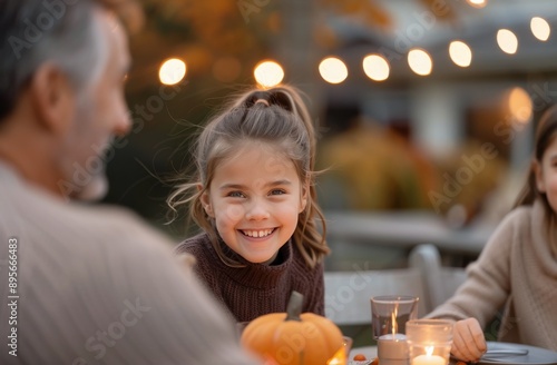 Girl Laughing at Halloween Dinner