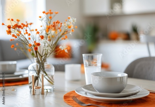 Modern Dining Room With Orange Placemats