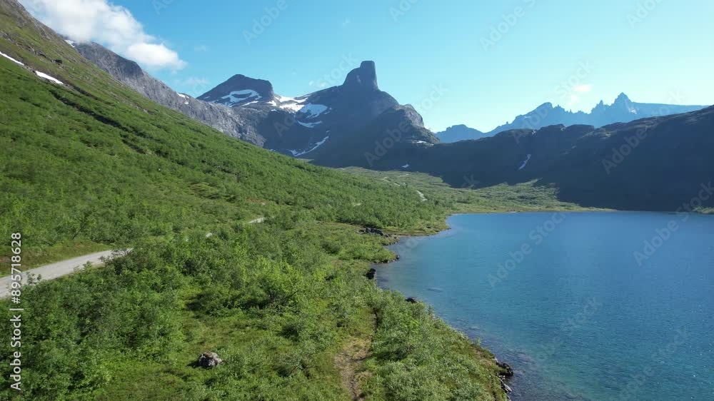 drone aerial view Venjesdalsvatnet lake in vengedalen valley in rauma in alndalsnes in summer drone aerial view Venjesdalsvatnet lake in vengedalen valley in rauma in alndalsnes in summer