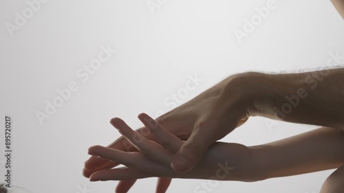 Young man and woman tender hands touching shot, passion intimacy mood, candid feelings, attraction and desire. Love and affection relationships concept.