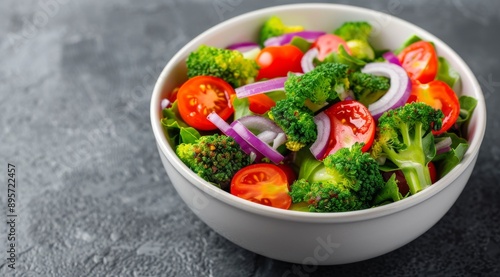 Broccoli, Tomato, and Onion Salad in White Bowl