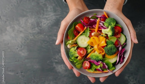 Hands Holding a Fresh Salad