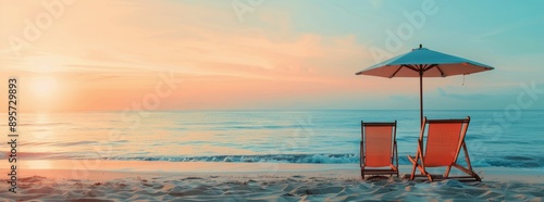 Beach Chairs Under Umbrella at Sunset