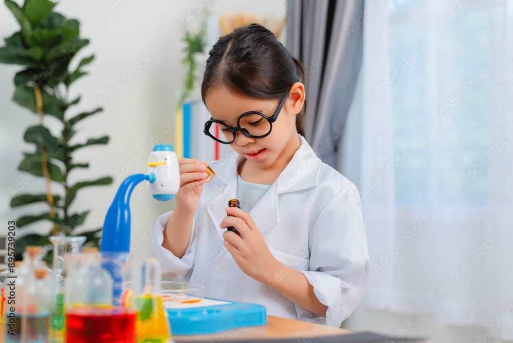 young Asia girl Scientist Conducting Experiment With Microscope In Laboratory young Asia girl Scientist Conducting Experiment With Microscope In Laboratory