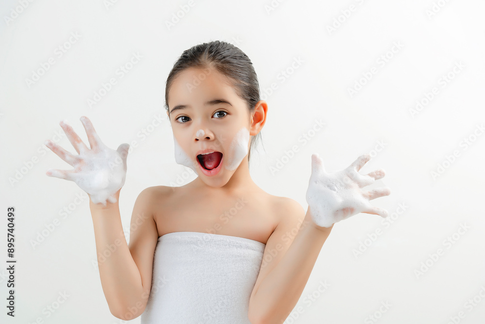 Adorable Girl Applying Facial Cream Smiling At Camera Adorable Girl Applying Facial Cream Smiling At Camera
