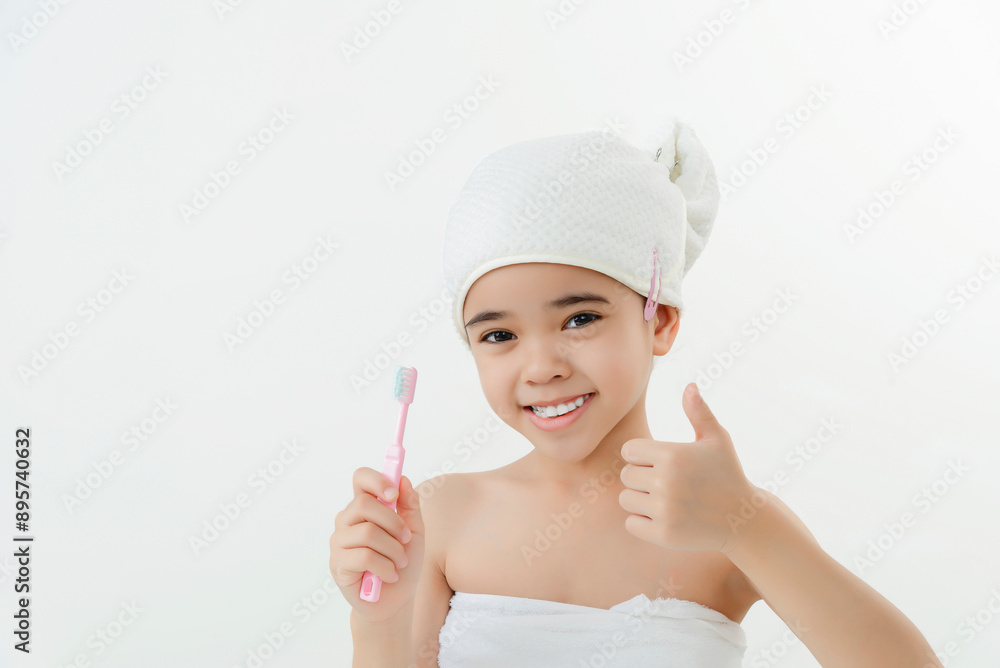 Smiling Child Brushing Teeth in Bathroom With Towel Wrap Smiling Child Brushing Teeth in Bathroom With Towel Wrap