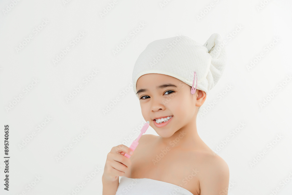 Smiling Child Brushing Teeth in Bathroom With Towel Wrap Smiling Child Brushing Teeth in Bathroom With Towel Wrap