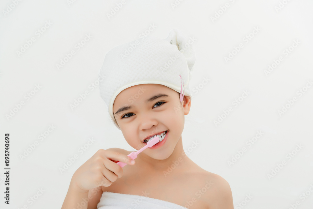 Smiling Child Brushing Teeth in Bathroom With Towel Wrap Smiling Child Brushing Teeth in Bathroom With Towel Wrap