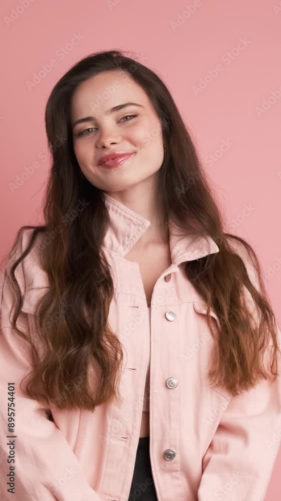 Portrait of happy young woman in pink denim jacket Portrait of happy young woman in pink denim jacket