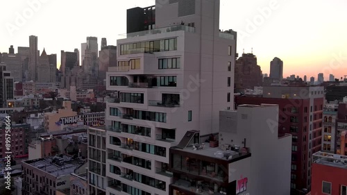 Aerial view city view of buildings and skyscrapers rooftops in New York City. Nolita district. photo