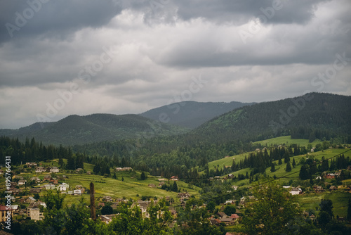 Traveling to the mountains in summer. Summer holiday in an authentic mountain village in summer.