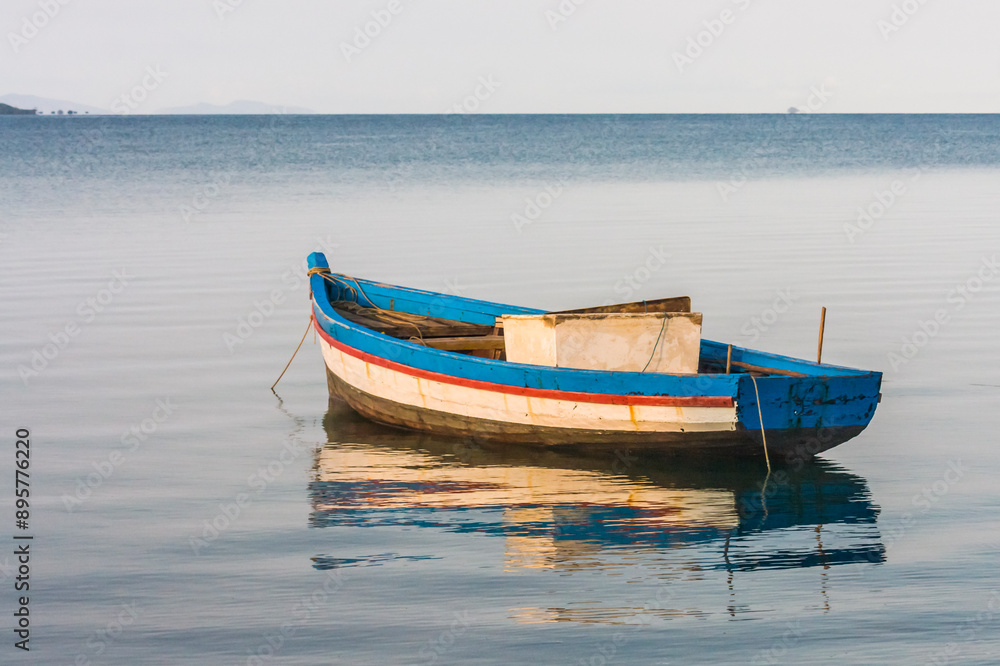Traditional fishing boat moored in the Antsiranana Bay, north of Madagascar. Traditional fishing boat moored in the Antsiranana Bay, north of Madagascar.