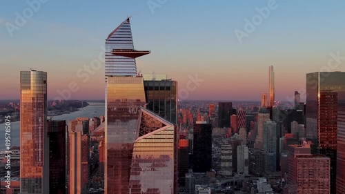 Aerial view of Hudson Yards skyscrapers in New York City at sunset.