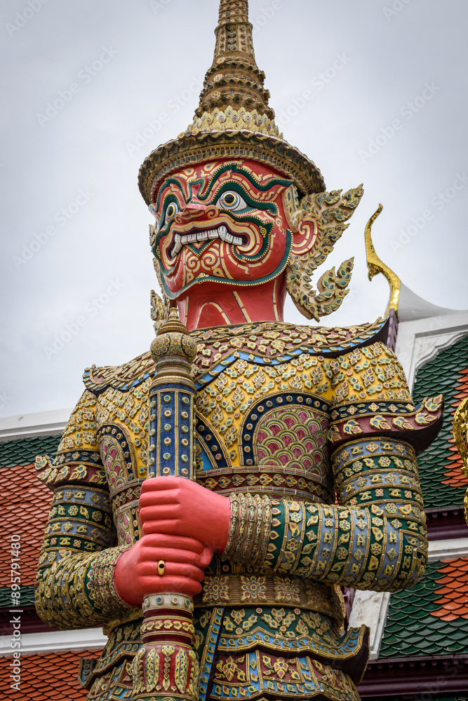 Giant guardian statues at Wat Phra Kaew. Giant guardian statues at Wat Phra Kaew.