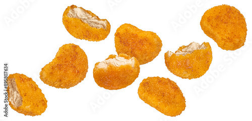 Quadro em tela Falling chicken nuggets isolated on white background