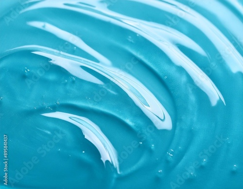 コスメ素材　透明なジェルのテクスチャー　水色の背景