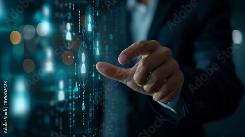 Businessman touching on digital screen with users icons data virtual hologram of business concept photo