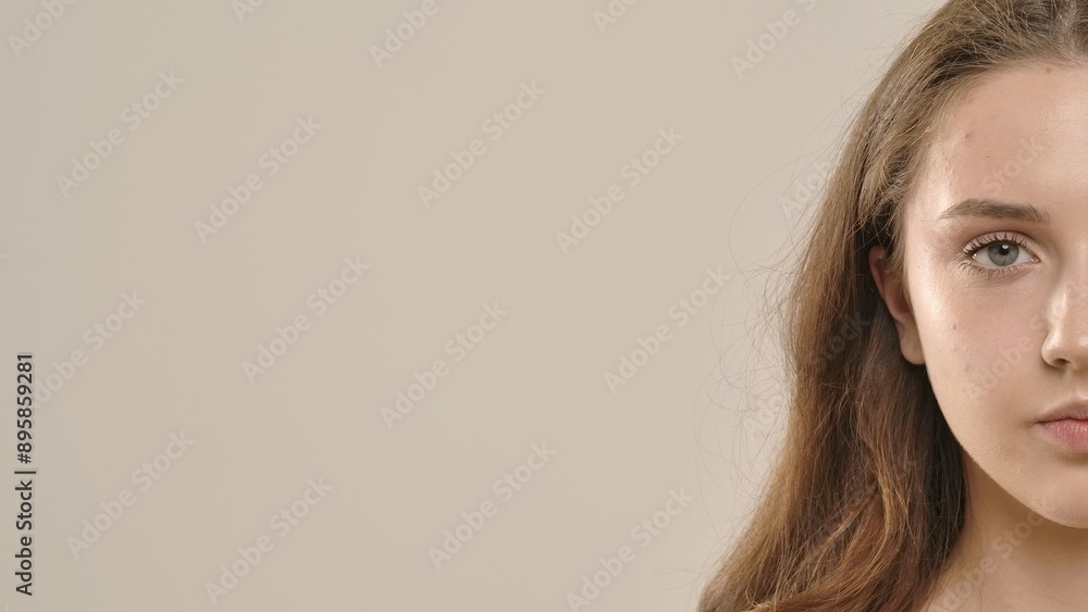 Young woman posing at camera smiling with wide white teeth smile, isolated on white background. Natural beauty and skin care concept Young woman posing at camera smiling with wide white teeth smile, isolated on white background. Natural beauty and skin care concept