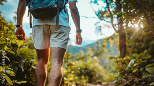 Solo Hiker on Lush Forest Trail at Sunset