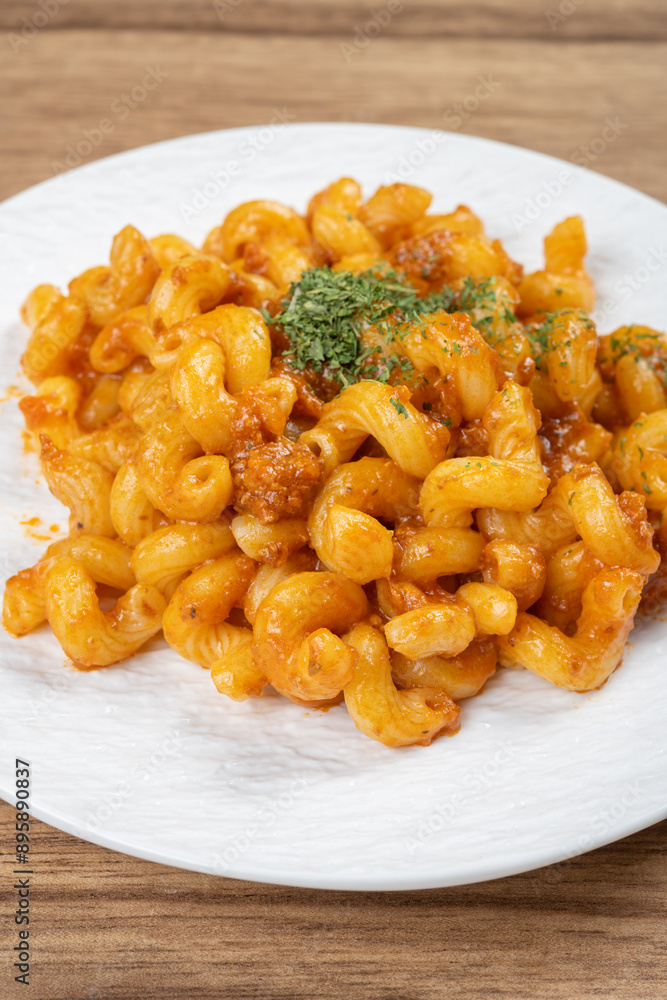 angle view dish of classic tomato bolognese pasta at vertical composition angle view dish of classic tomato bolognese pasta at vertical composition