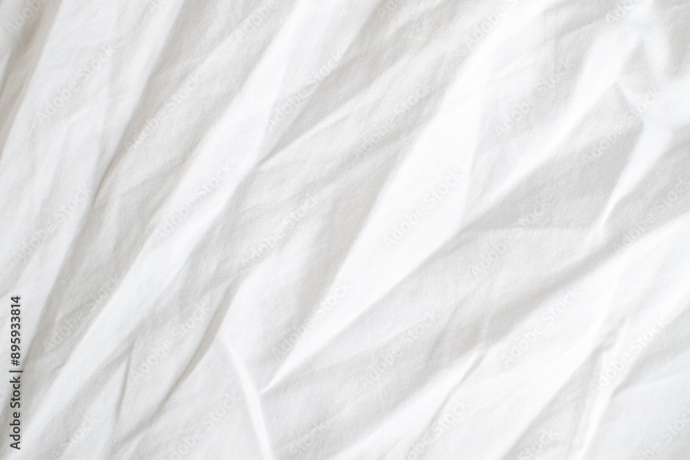 Abstract White Bedding Sheets or White wrinkled fabric background texture and Texture with copy-space :Creased or wrinkled white fabric,Soft focus Abstract White Bedding Sheets or White wrinkled fabric background texture and Texture with copy-space :Creased or wrinkled white fabric,Soft focus