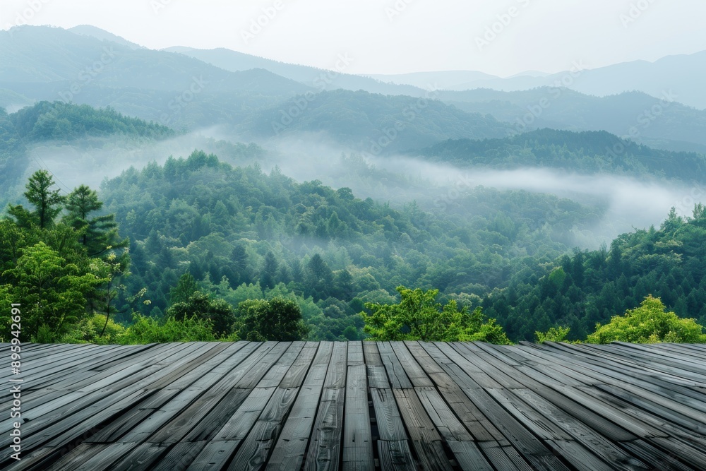 View from the empty wooden terrace over the mountains and forest in summer morning fog. Nature relax wallpaper View from the empty wooden terrace over the mountains and forest in summer morning fog. Nature relax wallpaper