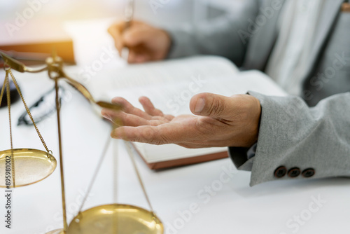 Slika na platnu freelance legal consultant advises client on a lawsuit, discussing plans and rights while focusing on honesty and integrity, with legal books and scales at hand in a professional setting