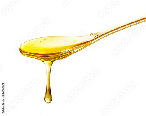 Honey dripping from spoon