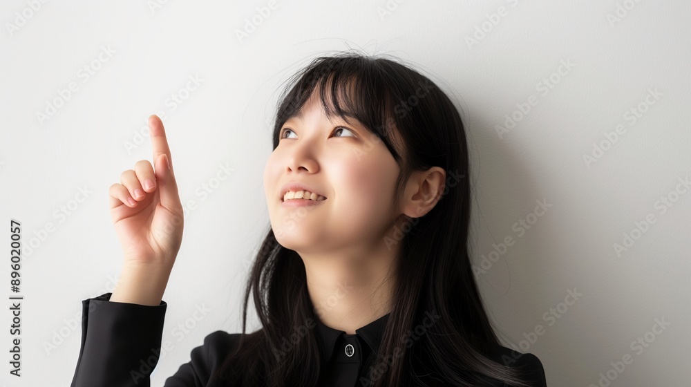 Portrait of smiling business woman pointing finger Portrait of smiling business woman pointing finger