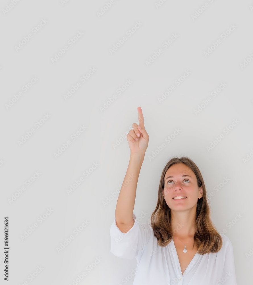 Portrait of smiling business woman pointing finger Portrait of smiling business woman pointing finger