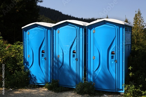 Portable toilets on mountain hiking trail in Poland