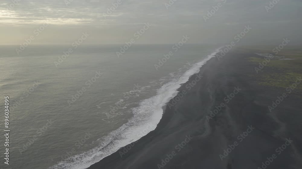 Aerial top view of wave of Black Sand Beach Reynisfjara in Iceland. Aerial top view of wave of Black Sand Beach Reynisfjara in Iceland.