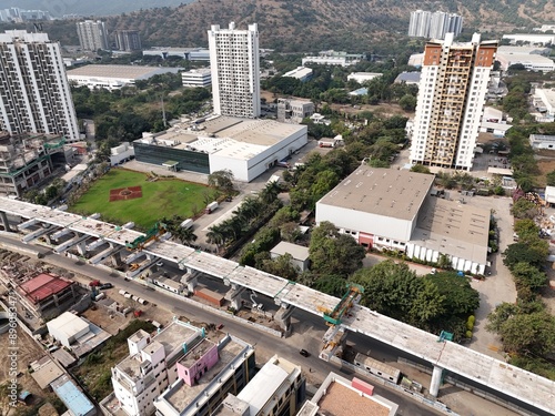 Aerial drone view of city pune hinjewadi near wakad with metro line