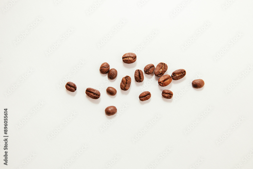 Coffee beans on white background, caffeine drink and food cooking Coffee beans on white background, caffeine drink and food cooking