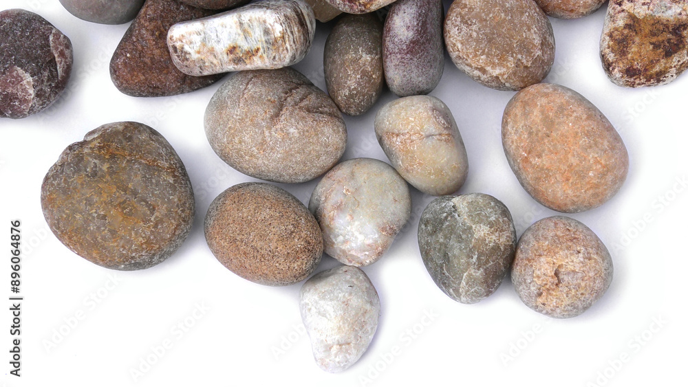 Pebbles piled on white background Pebbles piled on white background