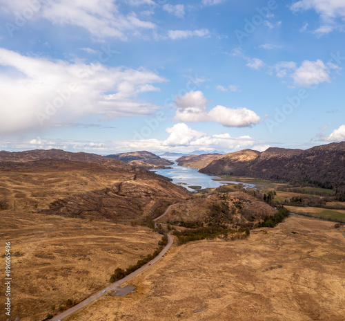 Aerial view of Loch Ailort with road, hills, water, and sky, Lochailort, Scotland, United Kingdom. photo