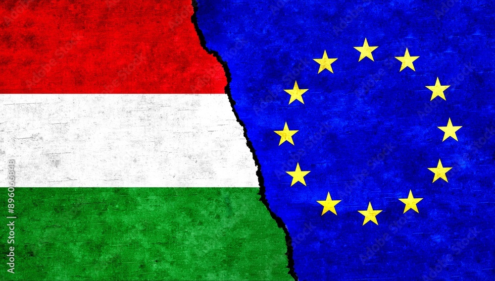 Hungary and European Union (EU) flag together on wall. EU Hungary relations, economy, friendship, conflict, trade concept. EU vs Hungary Hungary and European Union (EU) flag together on wall. EU Hungary relations, economy, friendship, conflict, trade concept. EU vs Hungary
