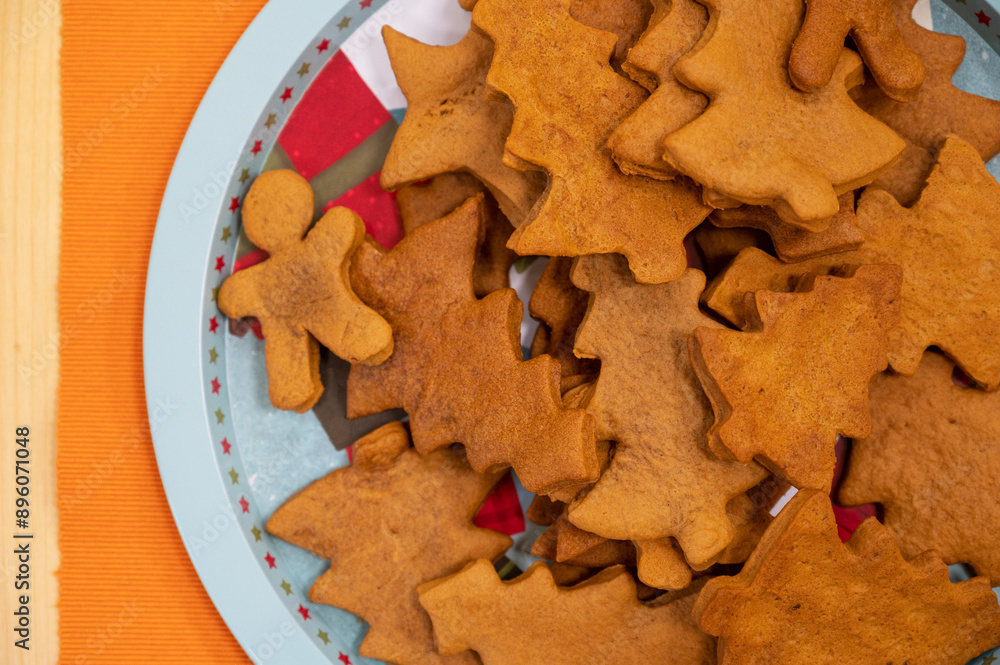 Plate with Christmas cookies on a table Plate with Christmas cookies on a table