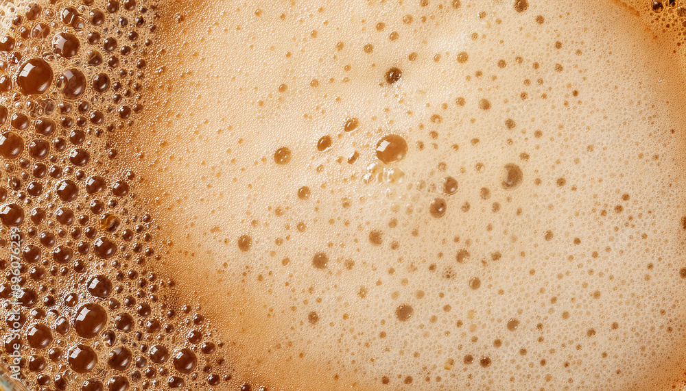 Creamy latte coffee foam texture, frothy surface. Delicious hot drink. Tasty beverage. Close-up. Creamy latte coffee foam texture, frothy surface. Delicious hot drink. Tasty beverage. Close-up.