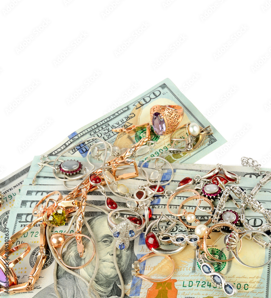Fototapeta premium American dollars and jewelry isolated on white. Free space for text.