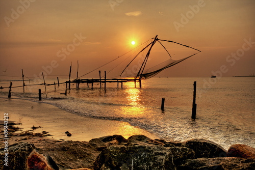 Chinese fishing nets, sunset, Arabian Sea coast, Kochi, Kerala, South India, India, Asia photo