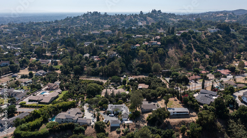 Afternoon aerial view of the sprawling neighborhood houses and hills of La Habra Heights, California, USA. photo