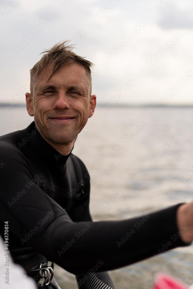 Portrait of a man professional kitesurfer. Portrait of a man professional kitesurfer.