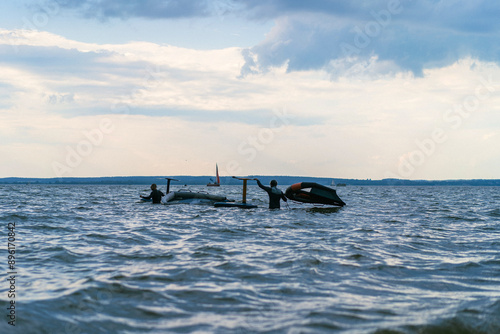 Wingfoil rider riding in the lake. photo