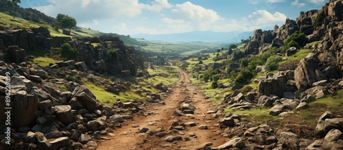 Rough rocky and remote dirt road in remote rural area near Cliffs, Natural scenery photo