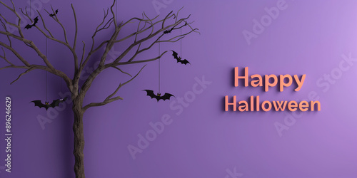 Creepy tree with hanging bats and Happy Halloween text on a purple background photo