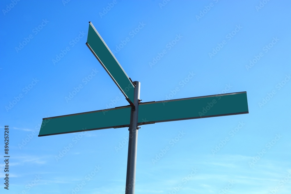 One and two empty street road signs on the opposite form an airplane symbol One and two empty street road signs on the opposite form an airplane symbol