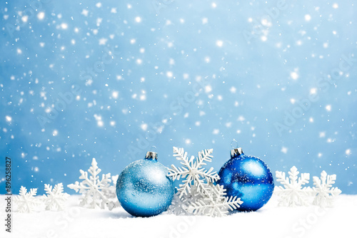 Blue Christmas Ornaments with Snowflakes on a Blue Background
