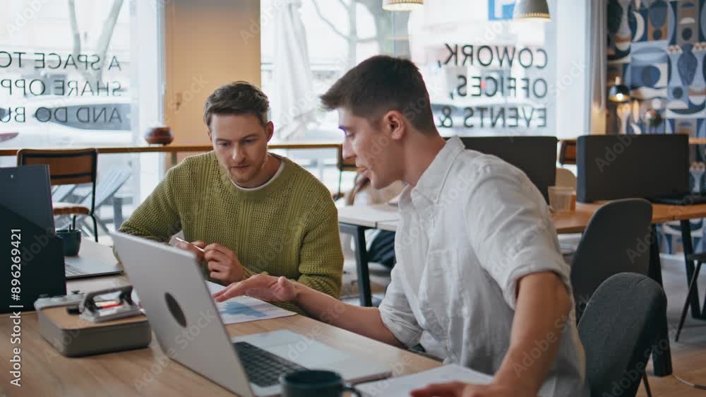 Focused coworkers creating ideas brainstorming at office conference room desk. Focused coworkers creating ideas brainstorming at office conference room desk.