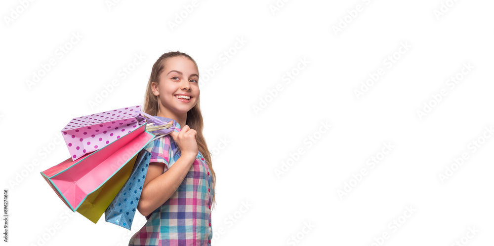 Black Friday shopping. Shopper girl hold shopping bag isolated on white. Sale and discount. Purchasing present. Big sale and shopping. Teen girl in mall. Teen girl with shopping bag. Advertisement Black Friday shopping. Shopper girl hold shopping bag isolated on white. Sale and discount. Purchasing present. Big sale and shopping. Teen girl in mall. Teen girl with shopping bag. Advertisement